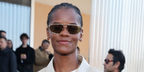 Letitia Wright was seen wearing gold Prada PR C51S 5AK70G sunglasses with olive lenses at the Prada Fall/Winter 2026 fashoin show during Milan Fashion Week.