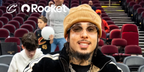 Rapper LiAngelo Ball, also known as GELO, was seen wearing ruthenium Bottega Veneta Sardine BV1386S 002 oval sunglasses with yellow lenses in Cleveland Cavaliers' Instagram post, December 2025.