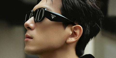 Chinese actor Li Xian was seen wearing black Prada PR 17WS 1AB5S0 Symbole Sunglasses at the Prada Menswear Fall/Winter 2024 fashion show during Milan Men's Fashion Week. Shop online now on Pretavoir