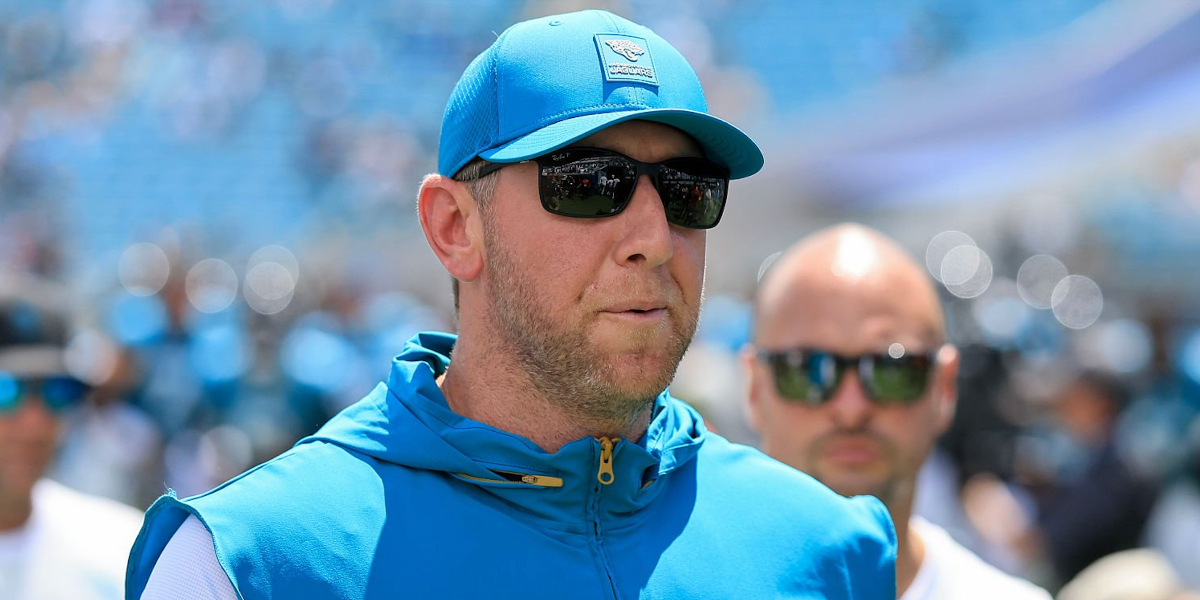 American football coach Liam Coen of Jacksonville Jaguars was seen wearing black Ray-Ban Liteforce RB 4179 601S/9A Polarised sunglasses during a match against the Carolina Panthers, September 2025.