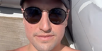 Singer-songwriter Logan Henderson of the Big Time Rush was seen wearing black and gold Garrett Leight Wilson 4003 MBK-MST/PGY round sunglasses in his Instagram post, May 2025.