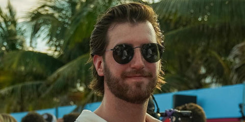 Canadian professional ice hockey player Logan Thompson was seen wearing black Ray-Ban Round Metal RB 3447 9199/31 sunglasses at the NHL All Stars skills competition 2023.