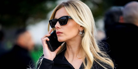 Celebrity, actress, and socialite Lola Bute was seen wearing black Saint Laurent Sun SL 276 Mica 001 cat eye sunglasses at the Dior Fall/Winter 2025 fashion show during Paris Fashion Week.