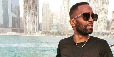 Rapper and podcaster Loons was seen wearing black and transparent Gucci GG0563SKN 001 sunglasses in his Instagram post, July 2022. Shop online now on Pretavoir