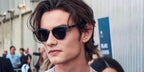 Louis Partridge is seen wearing Prada PR 17YS 1AB03R Polarised sunglasses to attend the brand's Sprig/Summer 2024 fashion show in Milan