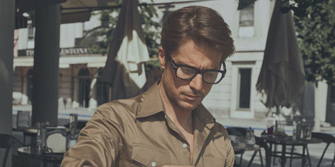 Emily in Paris star Lucas Bravo is seen wearing black Persol 3297V 95 glasses in the brand's Fall/Winter 2022 campaign