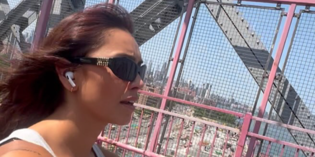 New Zealand actress Luciane Buchanan was seen wearing black Miu Miu MU 14ZS 16K08Z sunglasses while she was cycling in New York City, shared through her Instagram post in June 2025.