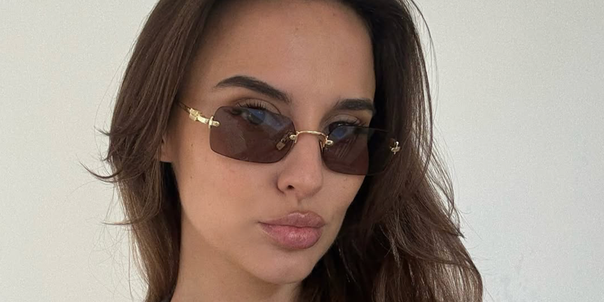 Reality television star Lucy Watson of Made In Chelsea was seen wearing gold Miu Miu MU B50S 5AK20I rimless sunglasses with brown purple lenses in her Instagram post, April 2026.
