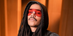 Luka Sabbat was seen wearing red Gucci GG2271S 003 shield sunglasses at the Gucci Fall/Winter 2026 fashion show during Milan Fashion Week.