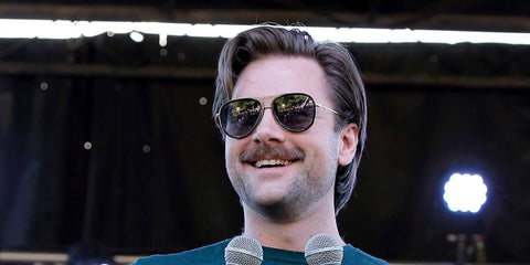Actor Luke Benward was seen wearing black and gold Gucci GG0062S 011 Polarised sunglasses onstage at the Hallmark Channel's "Countdown To Christmas" Takeover in Nashville, Tennessee, October 2025. Shop online now on Pretavoir