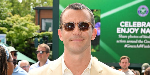 Bridgerton actor Luke Thompson was seen wearing Oliver Peoples Finley Esq Sun OV5298SU 1471/42 Blush/Rose Quartz sunglasses at the Wimbledon Tennis Championships 2025. Shop online now on Pretavoir