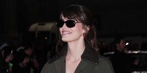 Pedro Pascal's actress sister Lux Pascal was seen wearing black and gold Bottega Veneta BV1440SA 001 sunglasses at the Bottega Veneta Fall/Winter 2026 fashion show during Milan Fashion Week.