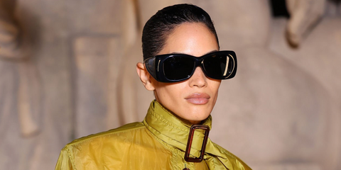 Singer and musician METTE was seen wearing black Saint Laurent Sun SL 901 HOWL 001 pillowed sunglasses at the Saint Laurent Fall/Winter 2026 fashion show during Paris Fashion Week.