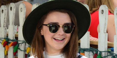 Maisie Williams was seen wearing tortoiseshell and gold Ray-Ban Clubmaster Classic 3016 W0366 half-rim sunglasses
