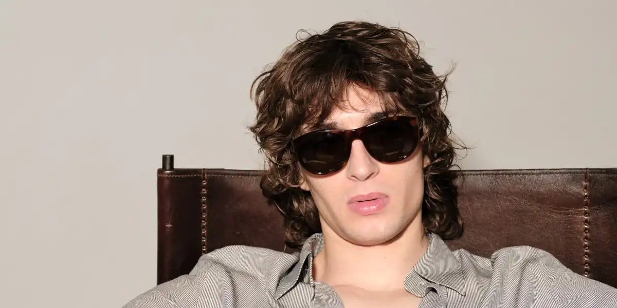 Musician and model Malcolm McRae was seen wearing tortoiseshell Saint Laurent SL 798 Maxime 003 sunglasses in a Revista de Milenio feature, March 2025