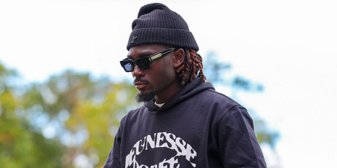 French footballer Manu Kone was seen wearing black Saint Laurent SL 572 001 sunglasses at Centre National du Football, France, October 2025. Shop online now on Pretavoir