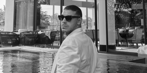 Colombian singer Manuel Medrano was seen wearing black Saint Laurent Sun SL 402 001 sunglasses in a The Hollywood Reporter Español feature, October 2025.