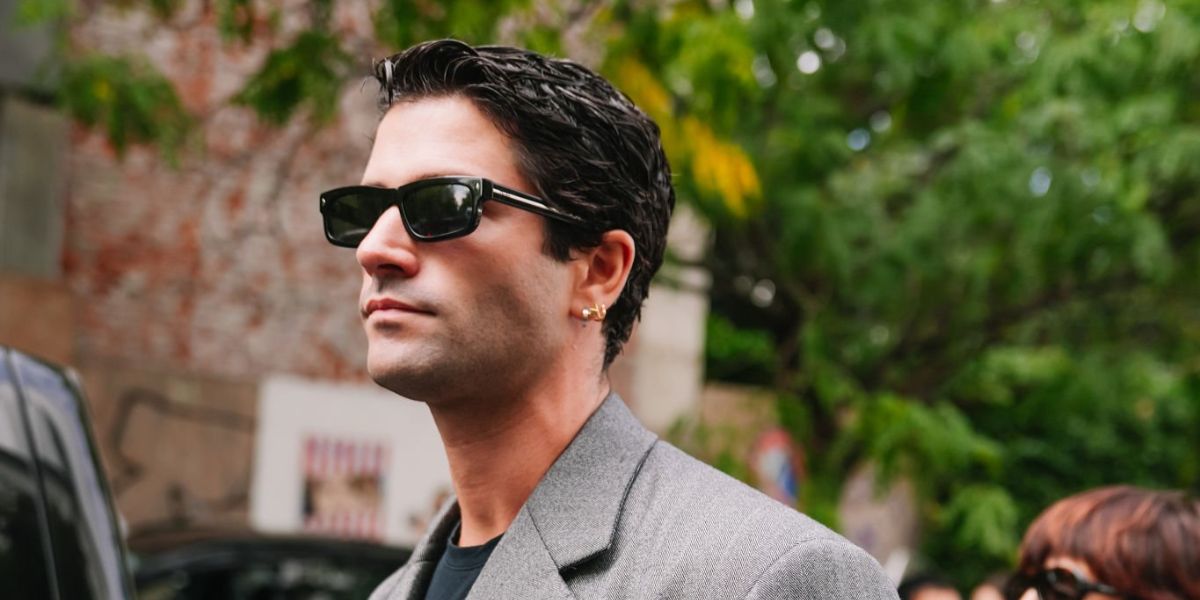 Spanish creative director Marc Forne was seen wearing black Prada PR B11S 16K731 sunglasses at the Prada Spring/Summer 2026 fashion show during Milan Fashion Week.