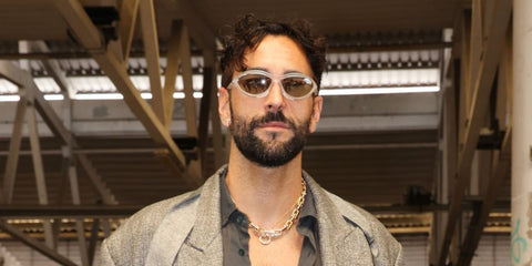 Italian singer Marco Mengoni was seen wearing transparent Prada PR A23S 14V60H sunglasses the Magliano Menswear Spring/Summer 2025 fashion show during Milan Men;s Fashion Week. Shop online now on Pretavoir