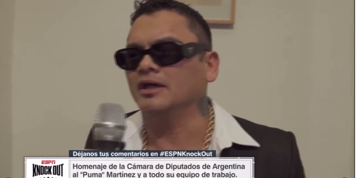 Argentine professional boxer Marcos Maidana was seen wearing black Prada PR 17WS 1AB5S0 Symbole Sunglasses in an interview with ESPN