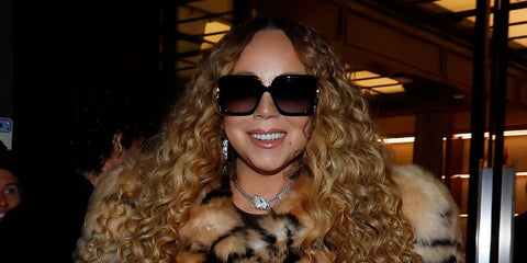 Mariah Carey was seen wearing black Gucci GG0876S 001 sunglasses with grey gradient lenses in Aspen, Colorado, December 2025.