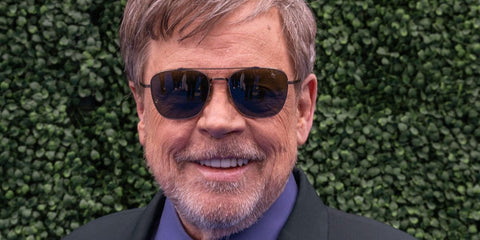 Actor Mark Hamill was seen wearing antique gold Oliver Peoples Avison OV1349ST 5284/52 sunglasses with green lenses at the Film Independent Spirit Awards 2026.