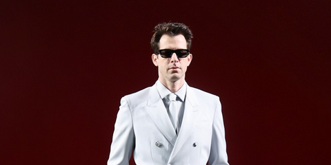 Mark Ronson wears Gucci GG1539S 001 sunglasses to the brand's Fall/Winter 2024 fashion show in Milan