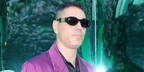 Italian rapper Marracash was seen wearing black Versace 4361 GB1/87 Medusa Biggie Sunglasses at the Versace Menswear Spring/Summer 2023 fashion show during Milan Men's Fashion Week