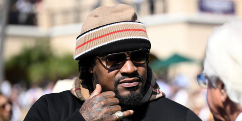 Former American football player Marshawn Lynch was seen wearing Dita Mach Six DTS 121 03 Black Iron and Black Rhodium sunglasses with brown gradient lenses at the 2025 Breeders' Cup World Championships in California, November 2025