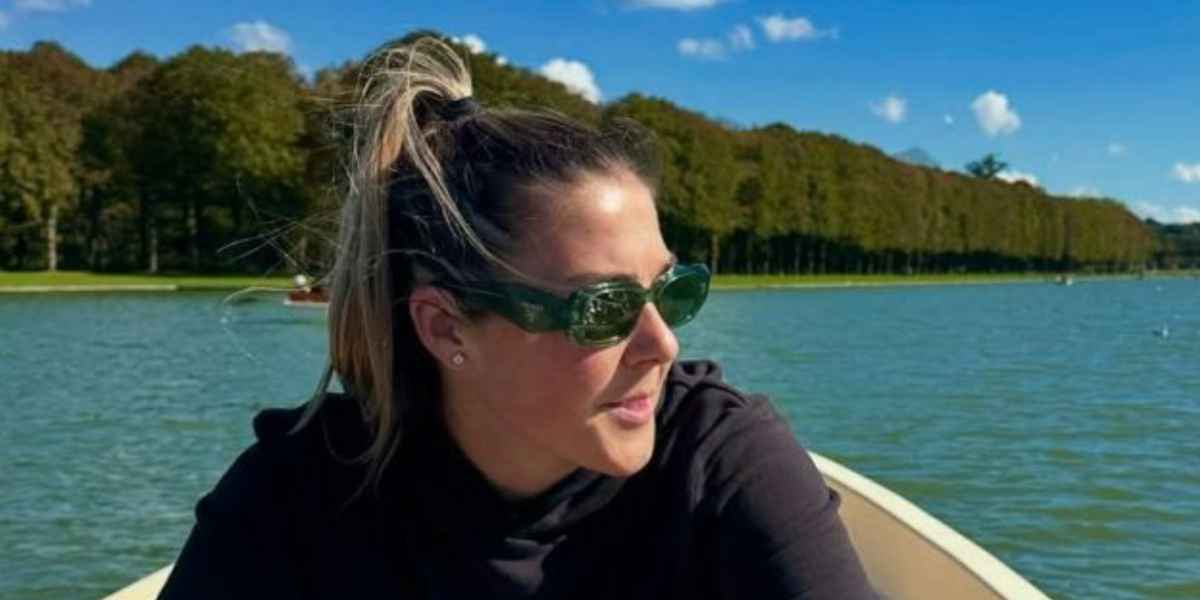Footballer Mary Earps of Paris Saint-Germain FC was seen wearing transparent bottle green Prada PR 17WS 19Z1I0 Symbole sunglasses with green lenses 
