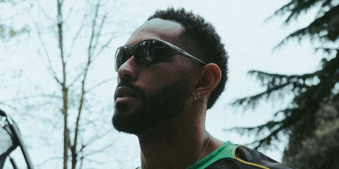 Brazilian footballer Matheus Cunha was seen wearing black Oakley Eye Jacket Redux OO9438 01 Prizm sunglasses in his Instagram post, April 2025.