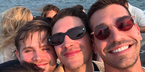Comedian and actor Matt Rogers (pictured on the far right) was seen wearing rose gold Dita Journey-Two DTS 168 02 round sunglasses with red lenses in his Instagram post, July 2025. Shop online now on Pretavoir
