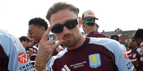 Footballer Matty Cash of Aston Villa FC was seen wearing black Prada PR 09ZS 1AB5S0 sunglasses at the trophy parade in Birmingham, following Aston Villa's victory at the Europa League championship in Instanbul, May 2026.