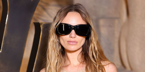 Model Maya Stepper was seen wearing black Saint Laurent Sun SL 901 HOWL 001 pillowed sunglasses at the Saint Laurent Fall/Winter 2026 fashion show during Paris Fashion Week.