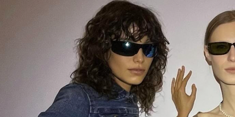 Argentine model Mica Arganaraz was seen wearing Miu Miu MU A02S 19Y10K sunglasses with blue mirrored lenses backstage at the Miu Miu Fall/Winter 2024 fashion show during Paris Fashion Week. Shop online now on Pretavoir