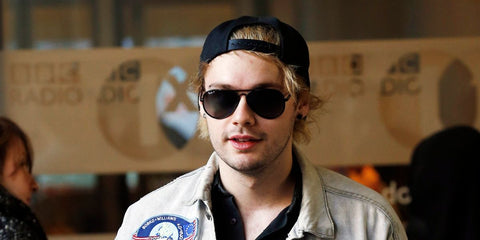 Australian musician Michael Clifford of 5 Seconds of Summer was seen wearing black Ray-Ban Aviator Max RB 3925 002/48 Polarised sunglasses at the BBC Radio 1 Studio in London, October 2015.