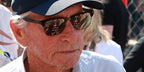 Michael Douglas was seen wearing striped brown Maui Jim Kawika H257-16C sunglasses with bronze lenses at the F1 Monaco Grand Prix 2024