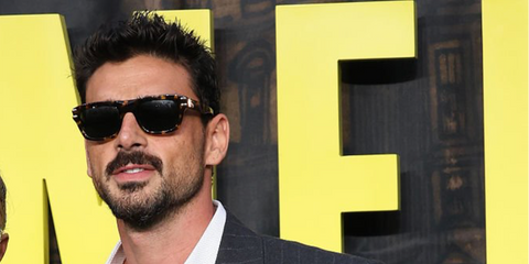 Michele Morrone was seen wearing yellow tortoise Dolce&Gabbana DG4496 3330/71 sunglasses at the season 2 premiere of The Gentlemen in London, September 2026.