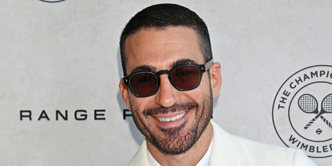 Spanish actor Miguel Angel Silvestre was seen wearing transparent grey Prada PR A16S 17T05D sunglasses with brown lenses at the Wimbledon Tennis Championships 2025.