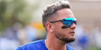 Venezuelan baseball player Miguel Rojas of Los Angeles Dodgers was seen wearing steel Oakley EVZero Blades OO9454 03 sunglasses with Prizm sapphire lenses during a spring training game against the San Diego Padres in February 2024.