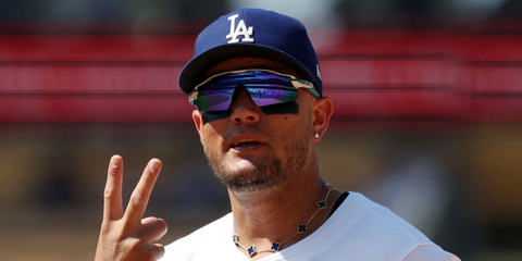 Venezuelan baseball player Miguel Rojas of Los Angeles Dodgers was seen wearing white and blue Oakley Radar EV Path OO9208 57 sunglasses during the game against the Milwaukee Brewer in July 2025.