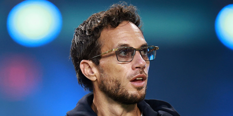 Mike McDaniel was seen wearing gold Dita Triline DTX 195 01 rectangular sunglasses at the Miami Dolphins' game against the New York Jets at Hard Rock Stadium on September 29, 2025.