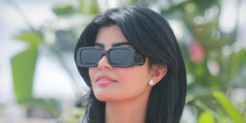 Saudi actress Mila Al Zahrani was seen wearing black Gucci GG1325S 001 rectangular sunglasses at the 2023 Cannes Film Festival