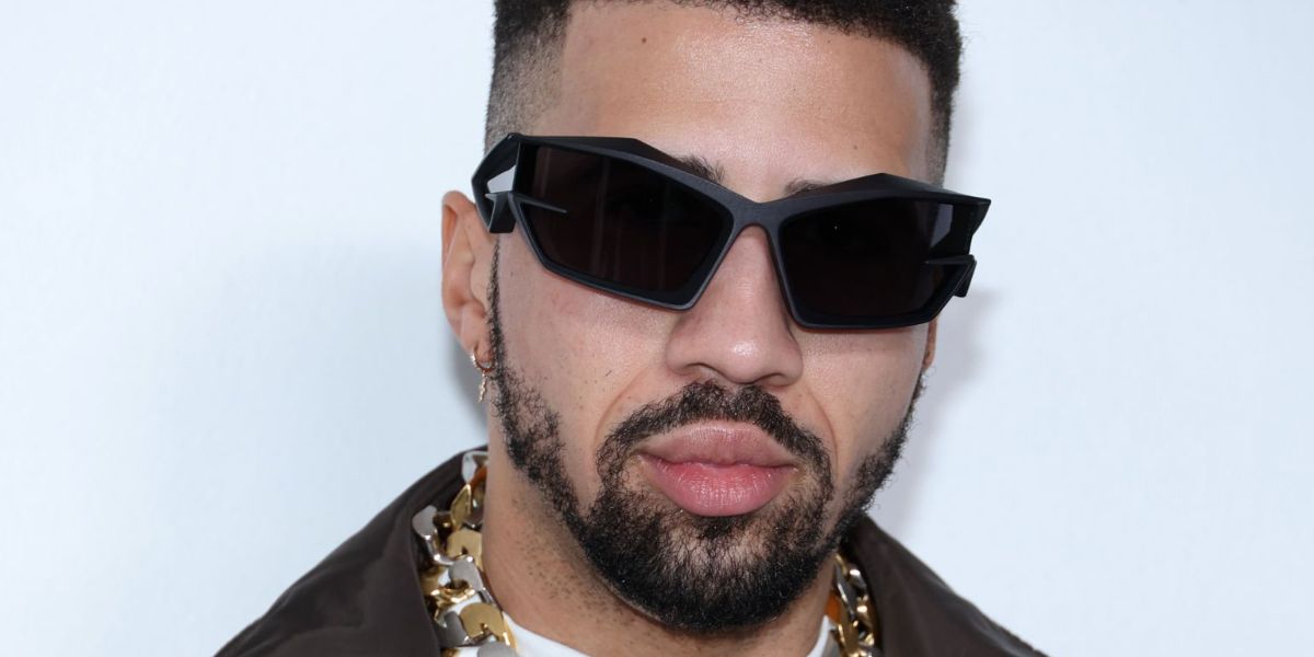 Fencing champion and Miles Chamley-Watson was seen wearing black Givenchy Giv Cut GV40049I 02A sunglasses to attend the Givenchy Menswear Fall/Winter 2023 fashion show during Paris Men's Fashion Week