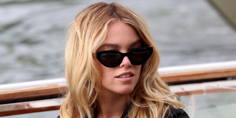 Milly Alcock was seen wearing black Miu Miu MU A04S 16K08Z cat eye sunglasses at the Venice Film Festival 2025. Shop online now on Pretavoir