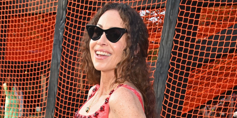 Actress Minnie Driver was seen wearing black Gucci GG0597S 001 cat eye sunglasses at The Serpentine Summer Party 2024 in London. Shop online now on Pretavoir