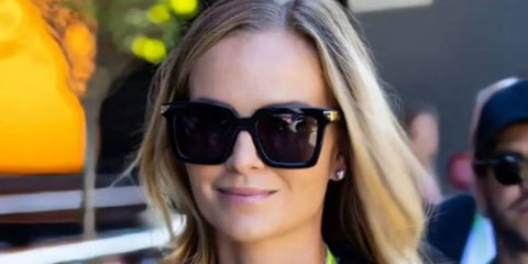 Finnish model and wife of Kimi Raikkonen, Minttu Raikkonen, was seen wearing black Bottega Veneta BV1005S 001 square sunglasses at the Italian Moto GP 2022. Shop online now on Pretavoir