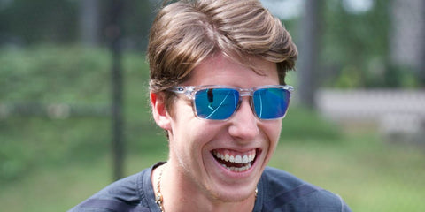 Canadian professional ice hockey player Mitch Marner was seen wearing transparent Oakley Sylas OO9448 04 Prizm sunglasses in a Team Oakley feature.