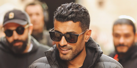 Egyptian director Mohamed Sami was seen wearing black Gucci GG0381SN 007 Polarised Black and Crystal sunglasses in his Instagram post, February 2025.