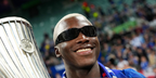 Ecuadorian footballer Moises Caicedo of Chelsea FC was seen wearing black Prada PR A19S 1AB5S0 wraparound sunglasses in a photograph with the UEFA Conference League trophy after his team's victory in the UEFA Conference League Final 2025